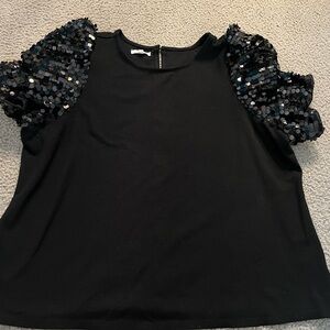 Maurice’s black sequin top